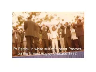 Pr Patrick in white suit with other Pastors on the Ernest Angley Crusade 1992