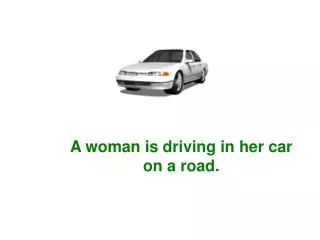 A woman is driving in her car on a road.