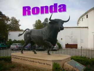 A statue of a bull outside la Plaza de Toros
